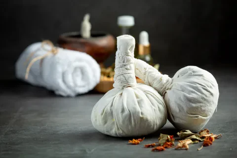 Massage with herbal bags